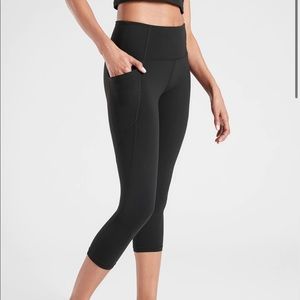 Athleta Salutation Stash Pocket in size Medium